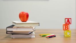  Books with an apple on top