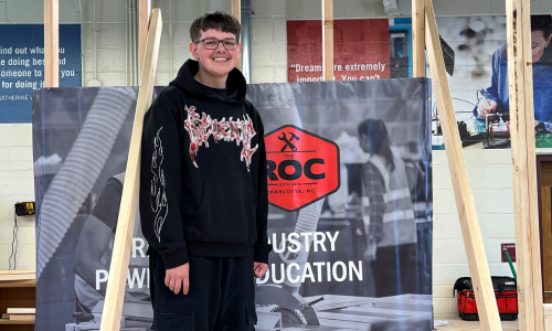  Isaiah Blevins stands in the construction class at West Mecklenburg High