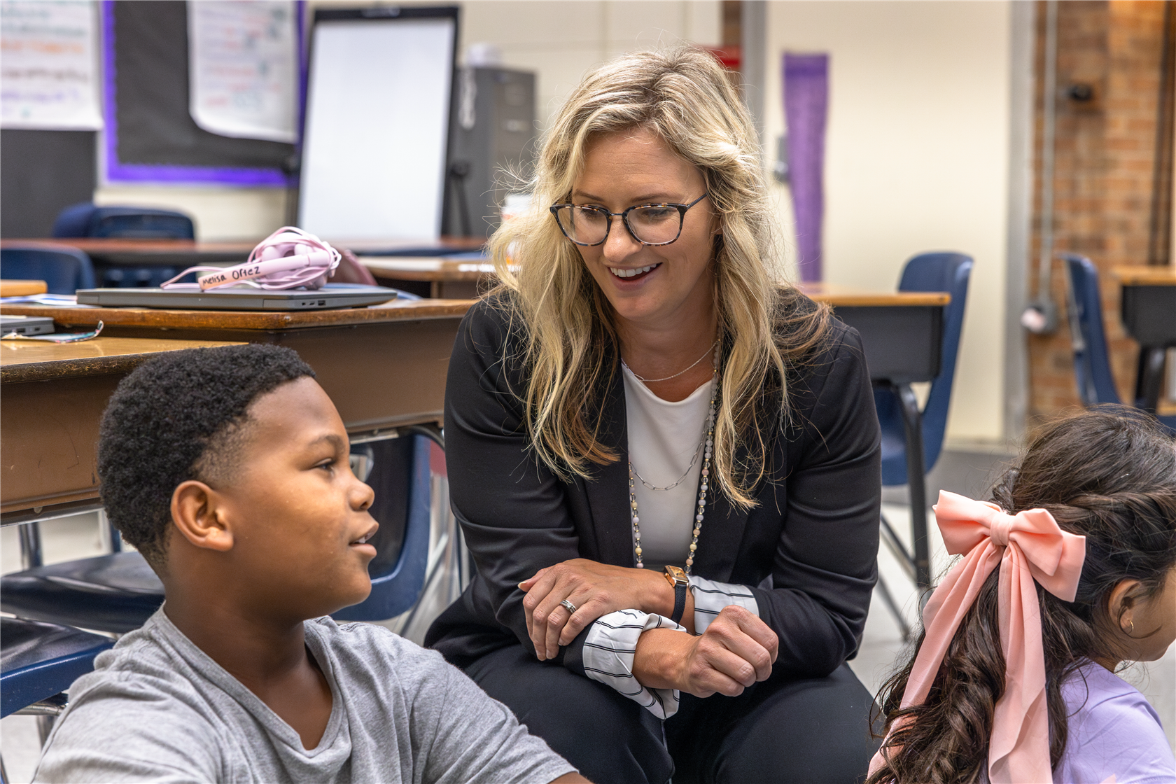 Principal Looney talking with a student